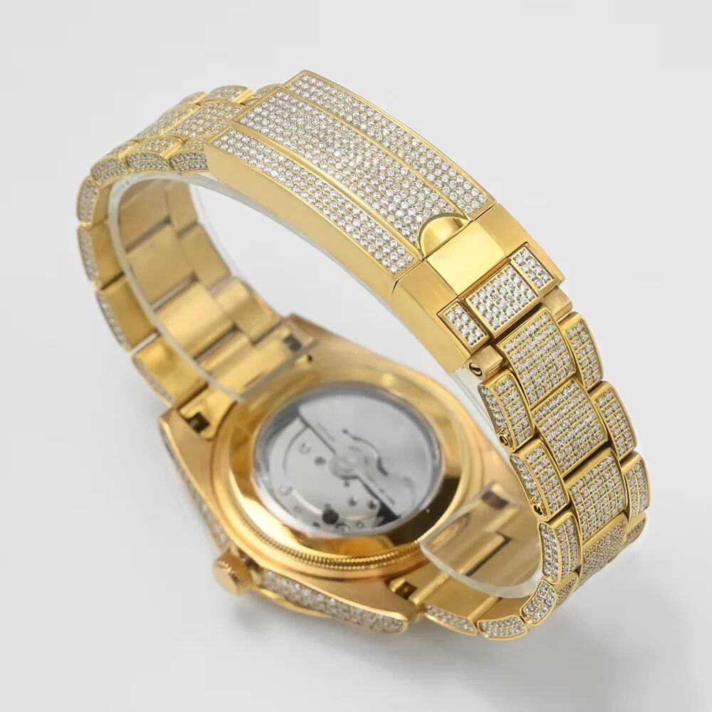 Case back and fully set bracelet of the gold-tone version