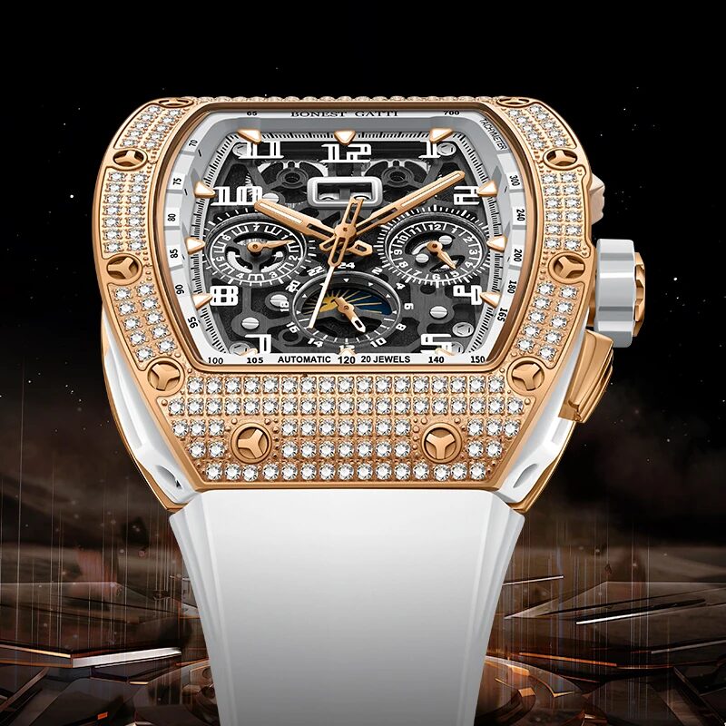 Rose-tone version of the gem-set tonneau watch on a white rubber strap